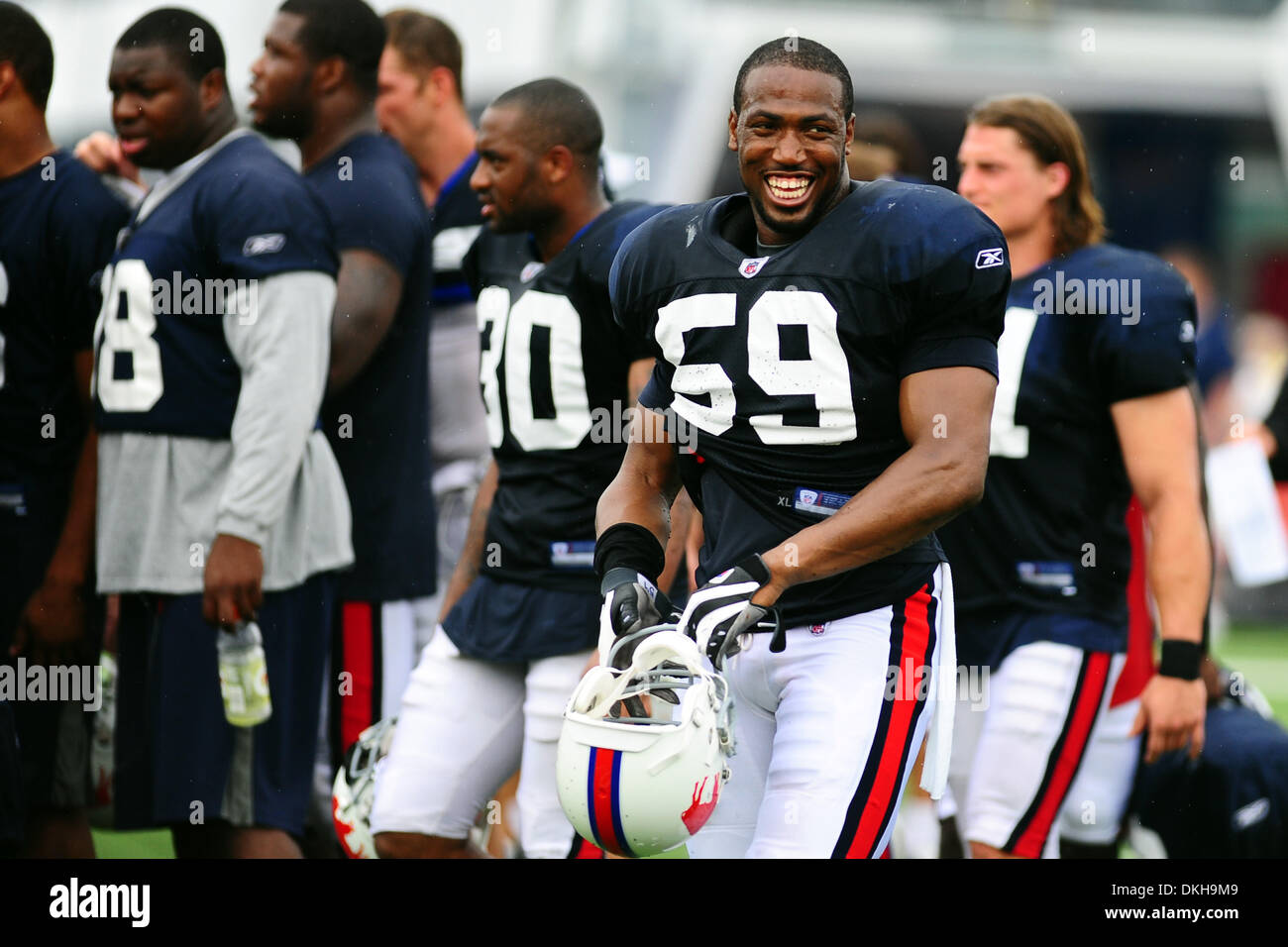 Buffalo Bills wide receiver Terrell Owens tucks the ball away after making  the catch during Sunday's training camp at St. John Fisher College in  Rochester, NY. (Credit Image: © Michael Johnson/Southcreek  Global/ZUMApress.com