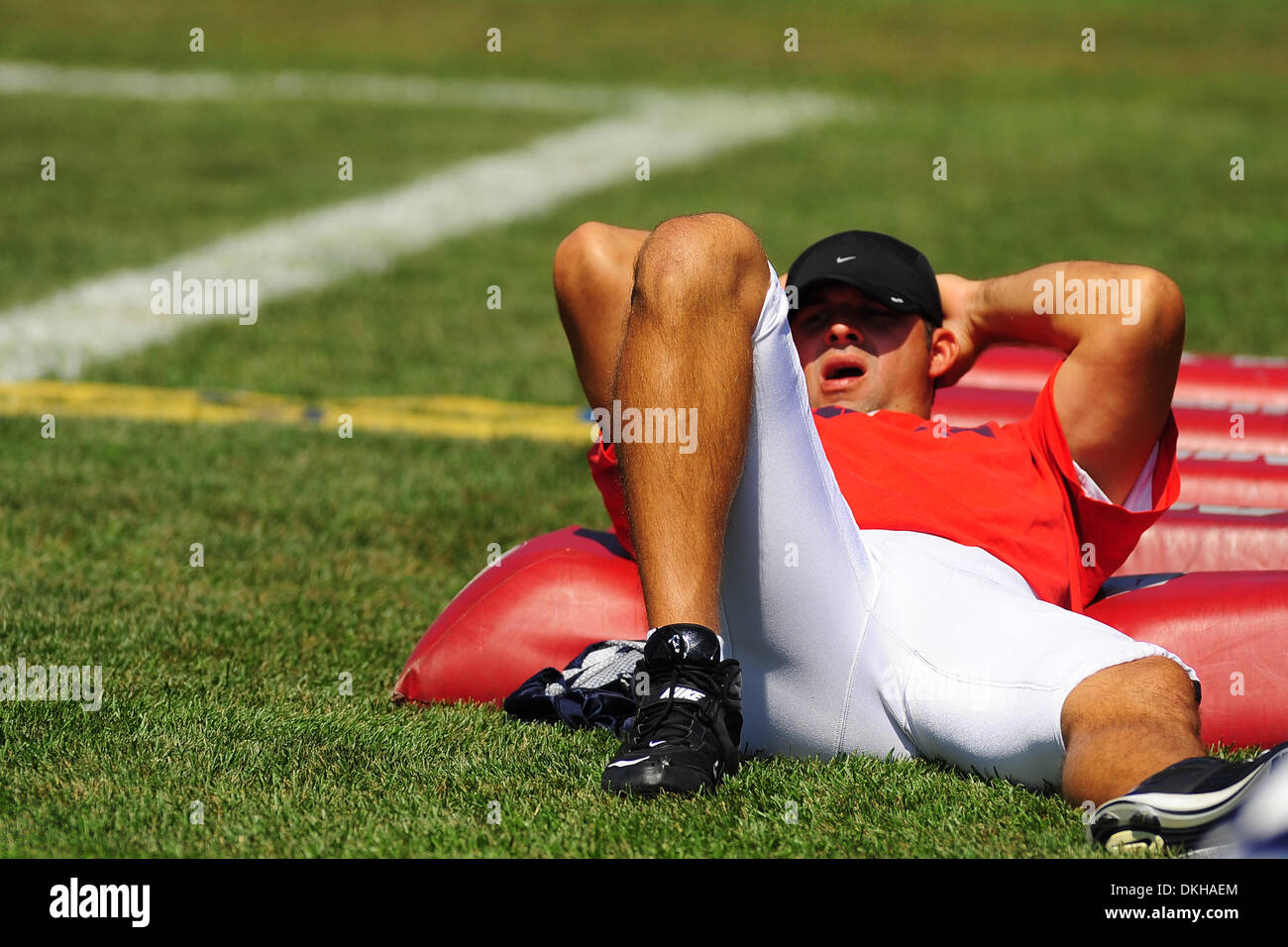 Buffalo Bills defensive end Aaron Schobel takes a rest on a blocking dummy  before Wednesday's practice at St. John Fisher College in Rochester, NY.  (Credit Image: © Michael Johnson/Southcreek Global/ZUMApress.com Stock  Photo 