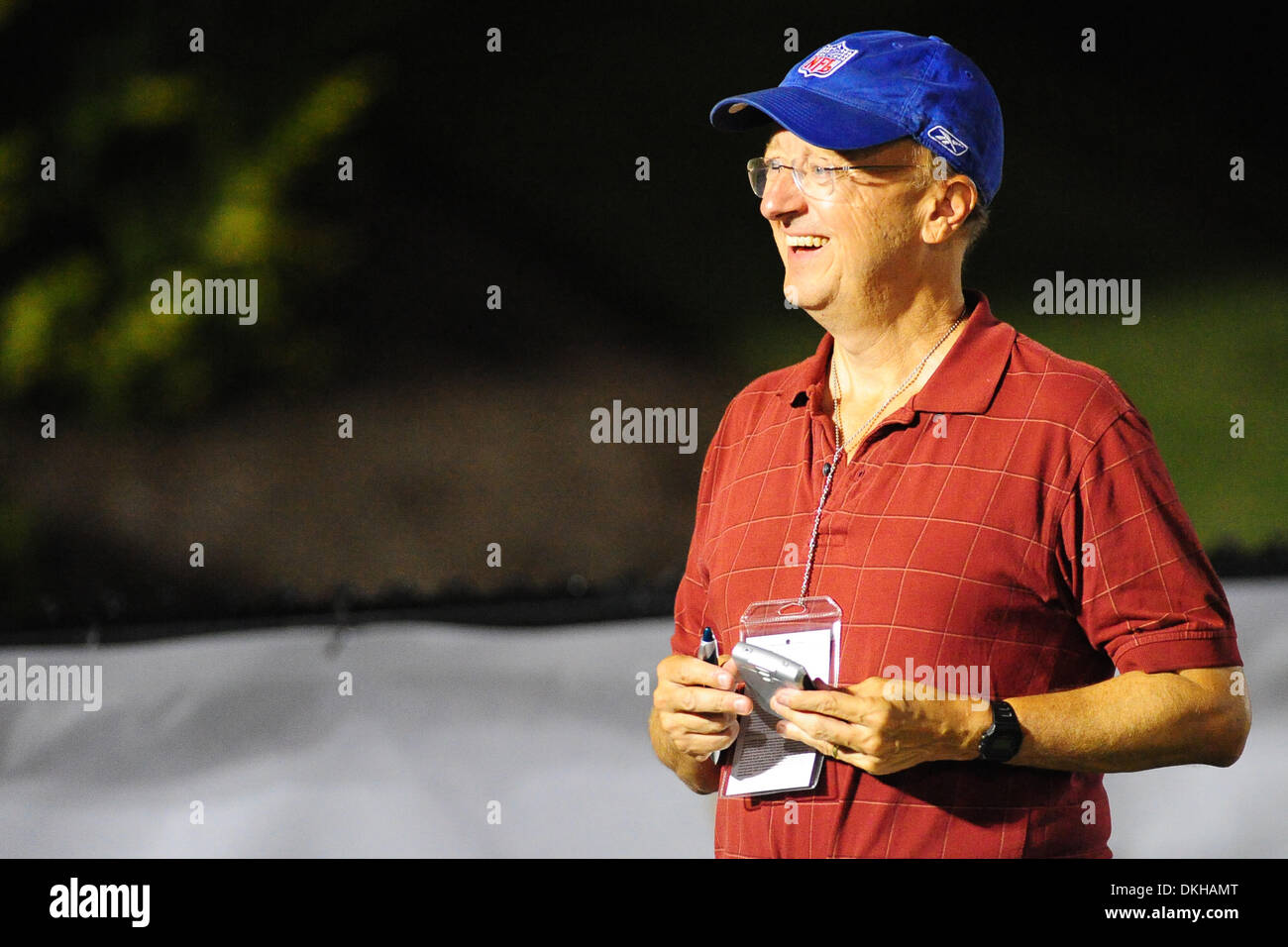 ESPN football reporter John Clayton watches the Buffalo Bills practice