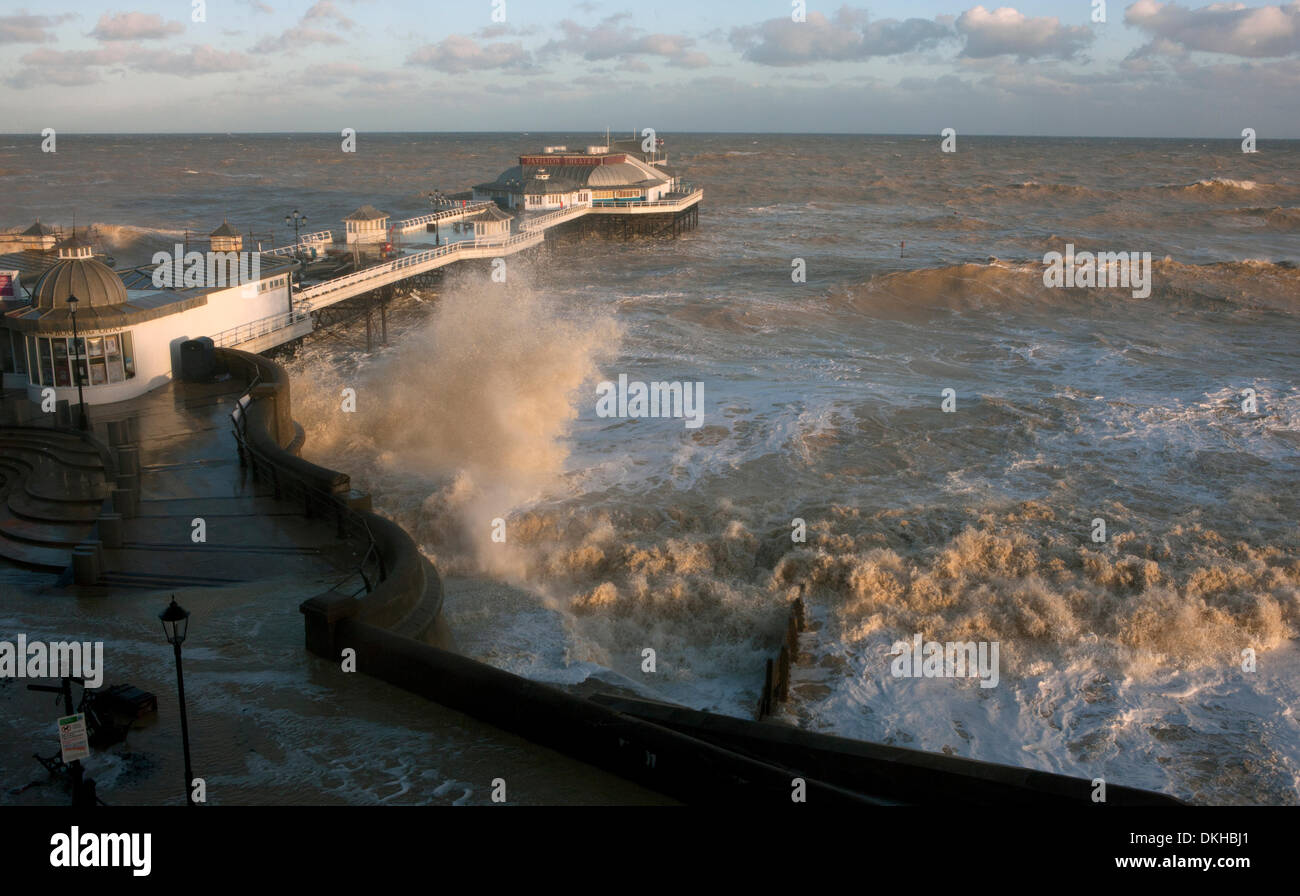 Cromer, Norfolk, UK. 6th December 2013. Waters from a spring high tide at 8.30am threaten to inundate the pier at Cromer in Norfolk UK in the strongest storm surge seen since 1953 Credit:  Tim James/The Gray Gallery/Alamy Live News Stock Photo