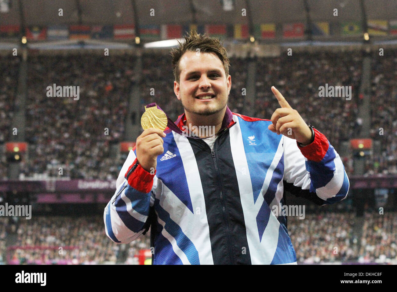 Aled Davies GB celebrates winning gold in the Men's Discus Throw - F42 at the London 2012 Paralympic games Stock Photo