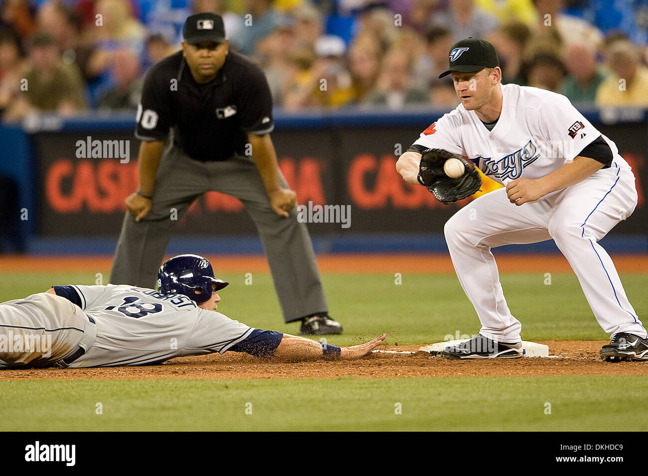 Tampa Bay Rays right fielder Ben Zobrist makes it back to first base during a game between the