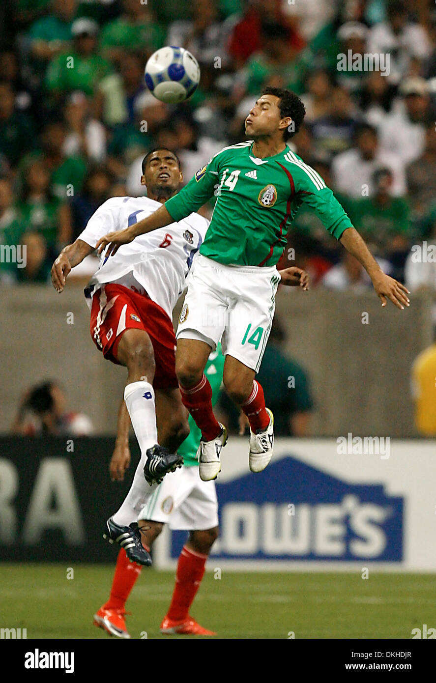 Mexico's Miguel Sabah battles in mid air with Panama's  Gabriel Gomez during the second period of play of the CONCACAF Gold Cup held at Reliant Stadium in Houston, Texas. The game ended in a 1-1 draw. (Credit Image: © Anthony Vasser/Southcreek Global/ZUMApress.com) Stock Photo