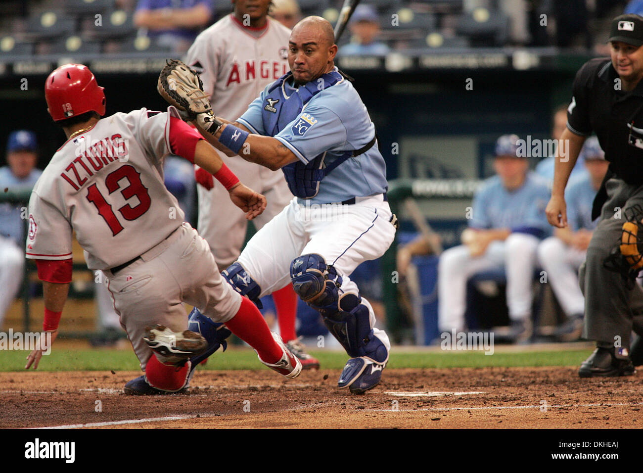 Los Angeles Angels' Maicer Izturis (13) slides under the tag from ...