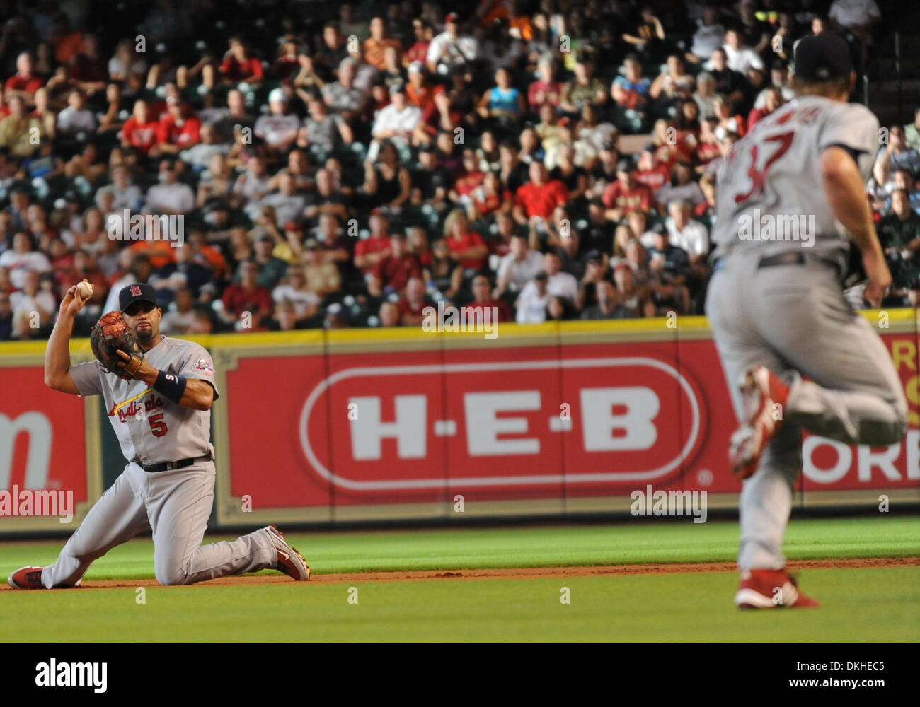 St. Louis Cadinals infielder, Albert Pujols, makes a throw to first ...