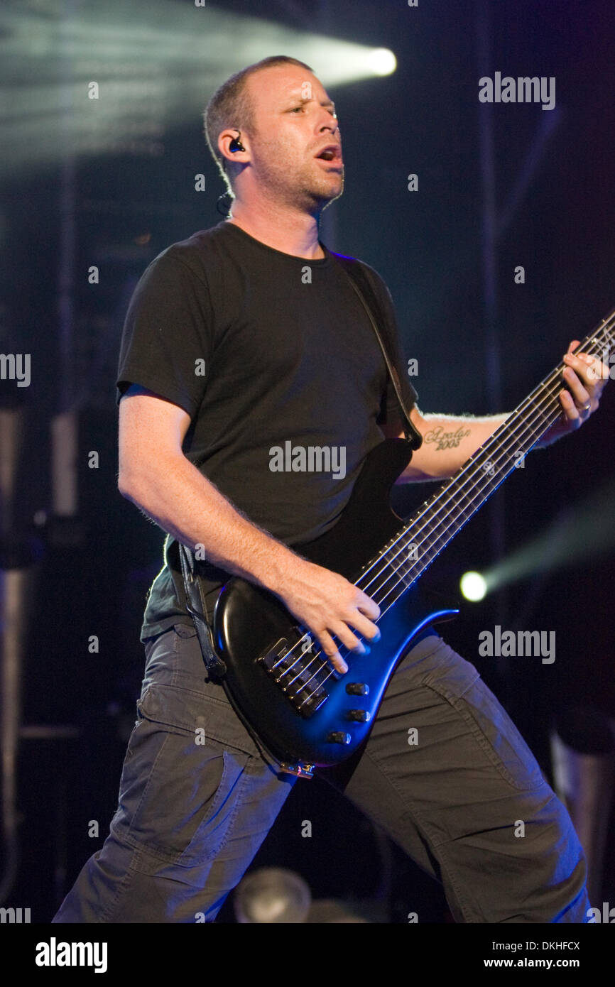 14 August 2009: Nickelback bass guitarist Mike Kroeger performs onstage ...