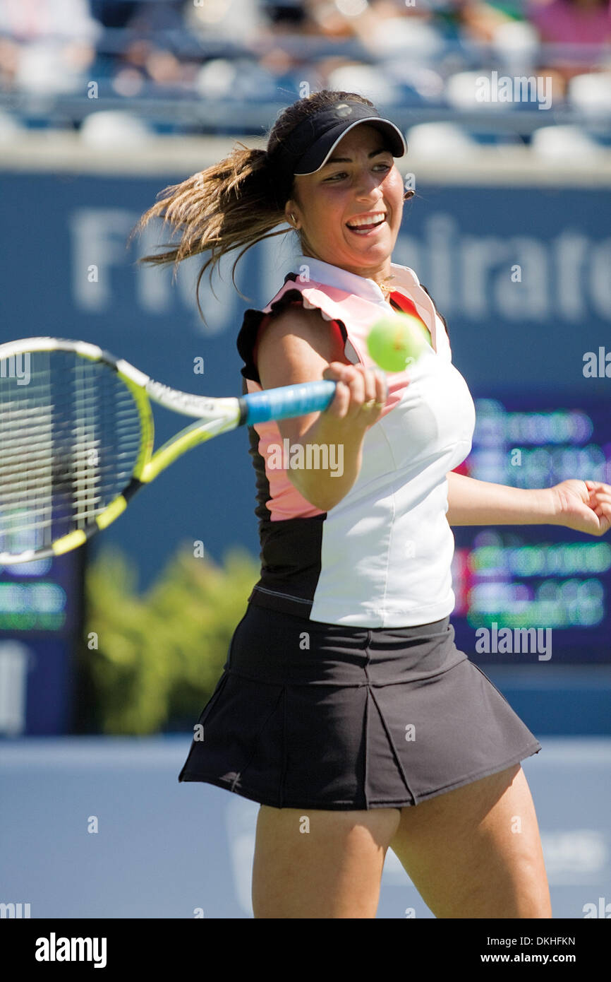 Aravane Rezai of France returns a forehand hit to Dinara Safina of Russia.  Safina, the world ranked number one women's tennis player was upset by Rezai  in three sets of the second