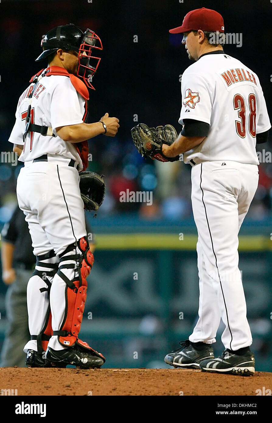 Aug. 5, 2009 - Houston, Texas, U.S - 05 August 2009: Houston pitcher Brian Moehler has a discussion with catcher Ivan Rodriguez atop the pitching mound as the Astros took on San Francisco at Minute Maid Park in Houston, TX. (Credit Image: © Southcreek Global/ZUMApress.com) Stock Photo