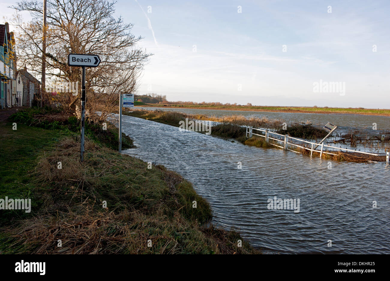 Cley, Norfolk, UK. 06th Dec, 2013. The main bus stop in the village of Cley lies underwater after storm surge waters breached sea defences and flooded the main coastal road between Cromer and Wells-Next-The-Sea, the A149. December 6, 2013. Credit:  Tim James/The Gray Gallery/Alamy Live News Stock Photo