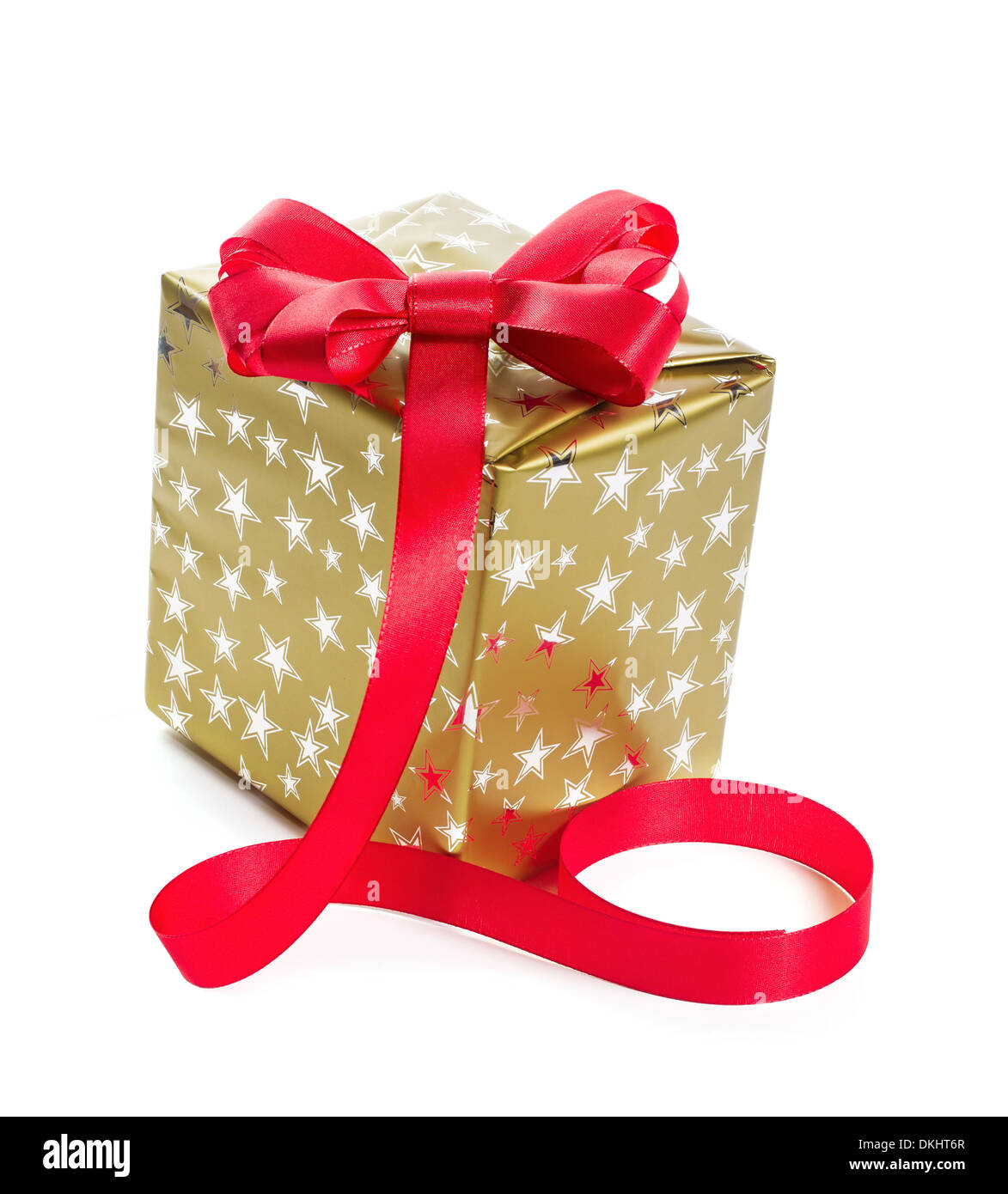 Gift in gold box with a red bow. Isolate on white background Stock Photo