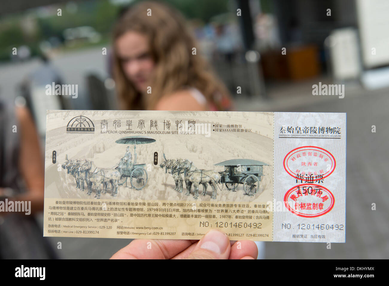 Tourist holding the entry pass of Emperor Qin Shin Huang's Mausoleum site Museum, Xi'an, Shaanxi, China. Stock Photo
