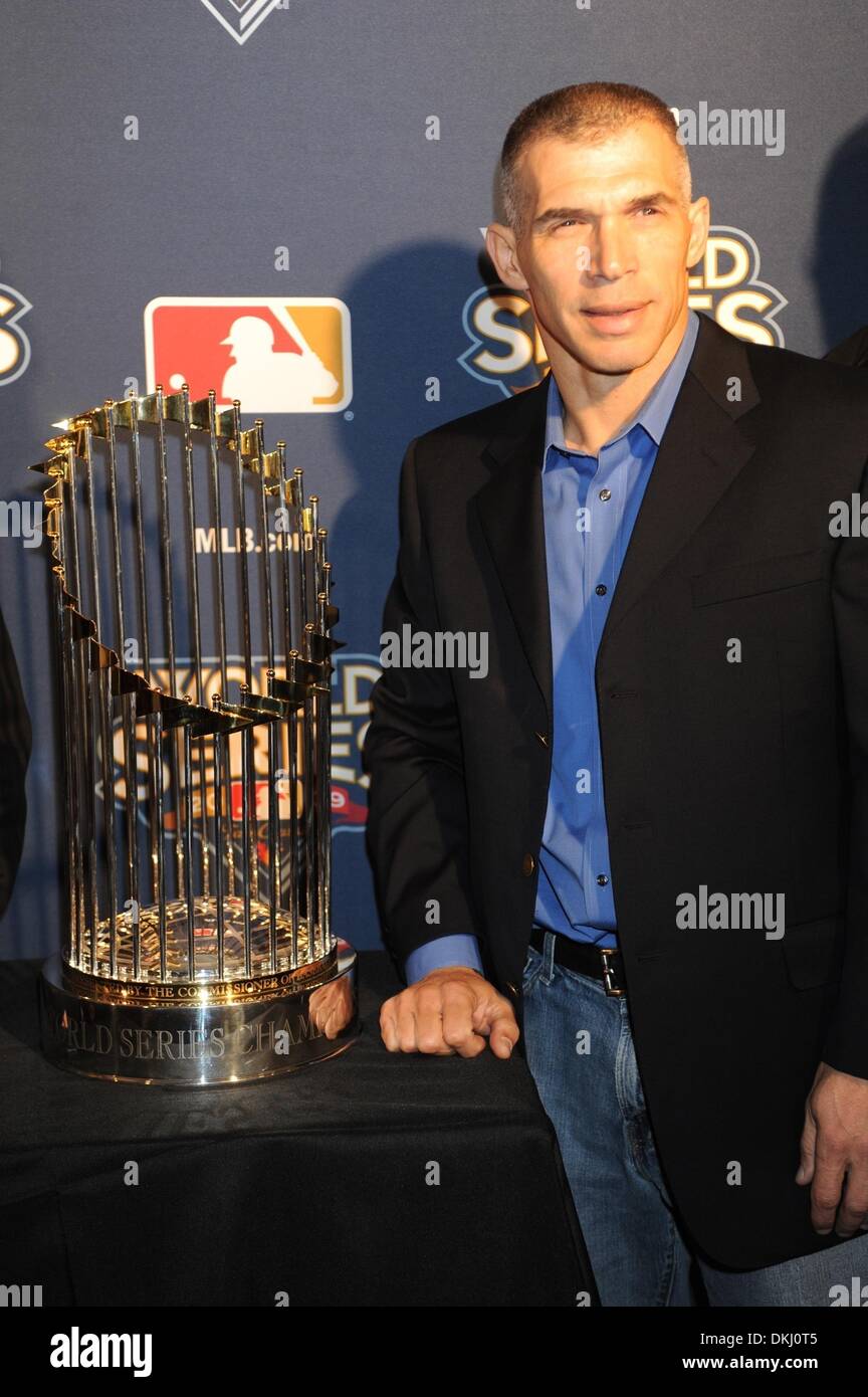 Nov 23, 2009 - Manhattan, New York, USA - Yankees Manager JOE GIRARDI with  the World Series Trophy as Major League Baseball Productions celebrates the  release of the DVD & BLU-RAY 2009