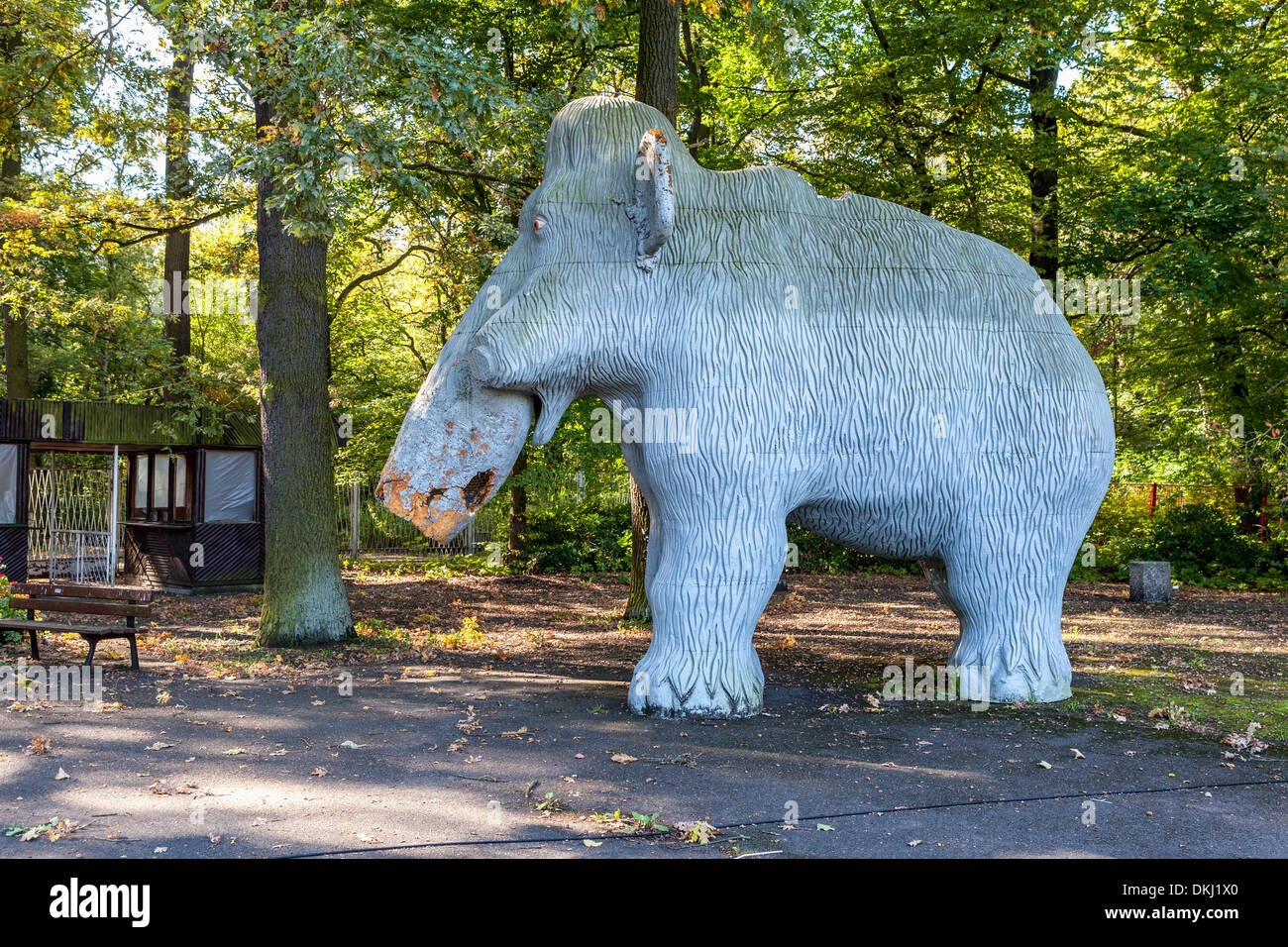 Giant model of battered woolly mammoth at the Spree Park (or Kulturpark Plånterwald), an abandoned amusement park - Berlin Stock Photo