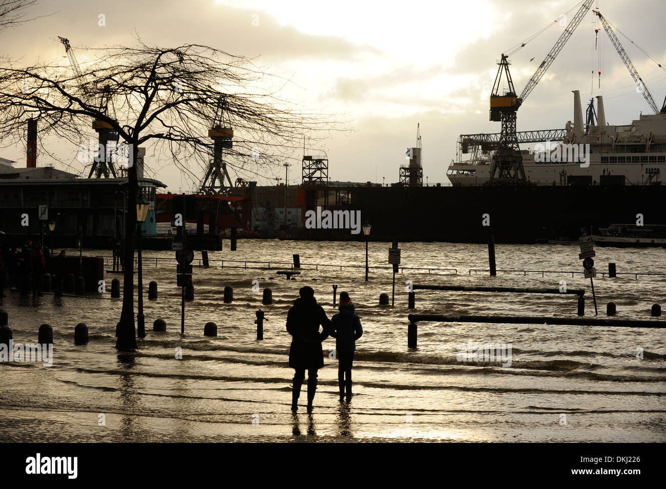 GERMANY Hamburg, storm flood Xaver, flood at river Elbe, docks of shipyard Blohm and Voss from fish market on 6.12.2013 Stock Photo