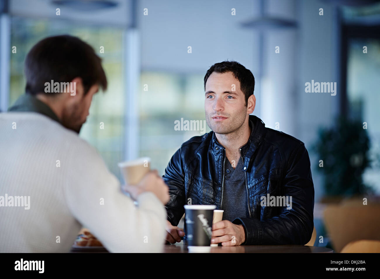 Men having coffee in cafe Stock Photo
