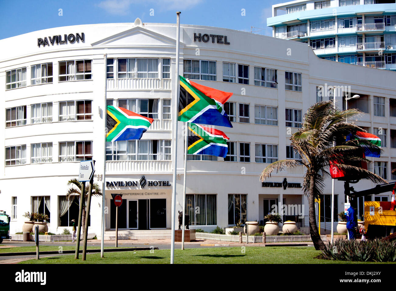 South African flags flying at half mast in honor of Nelson Mandela in