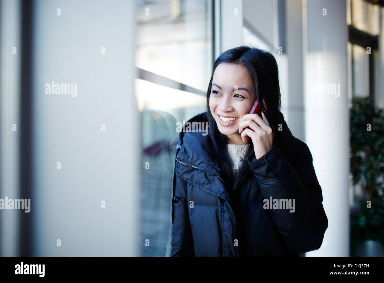 Woman talking on cell phone Stock Photo
