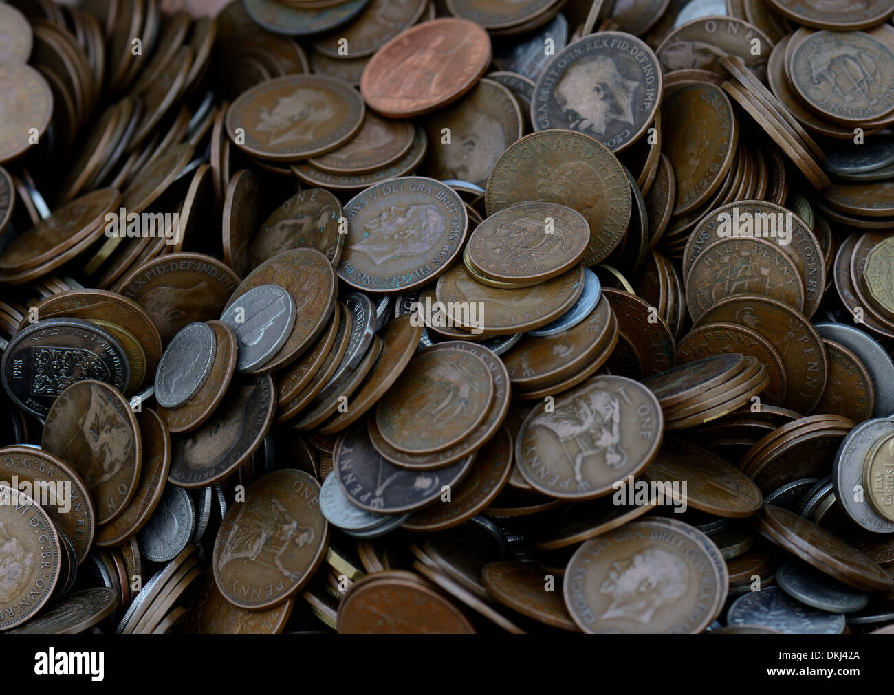 Pile of pennies,small copper and silver coins, mostly British Stock Photo