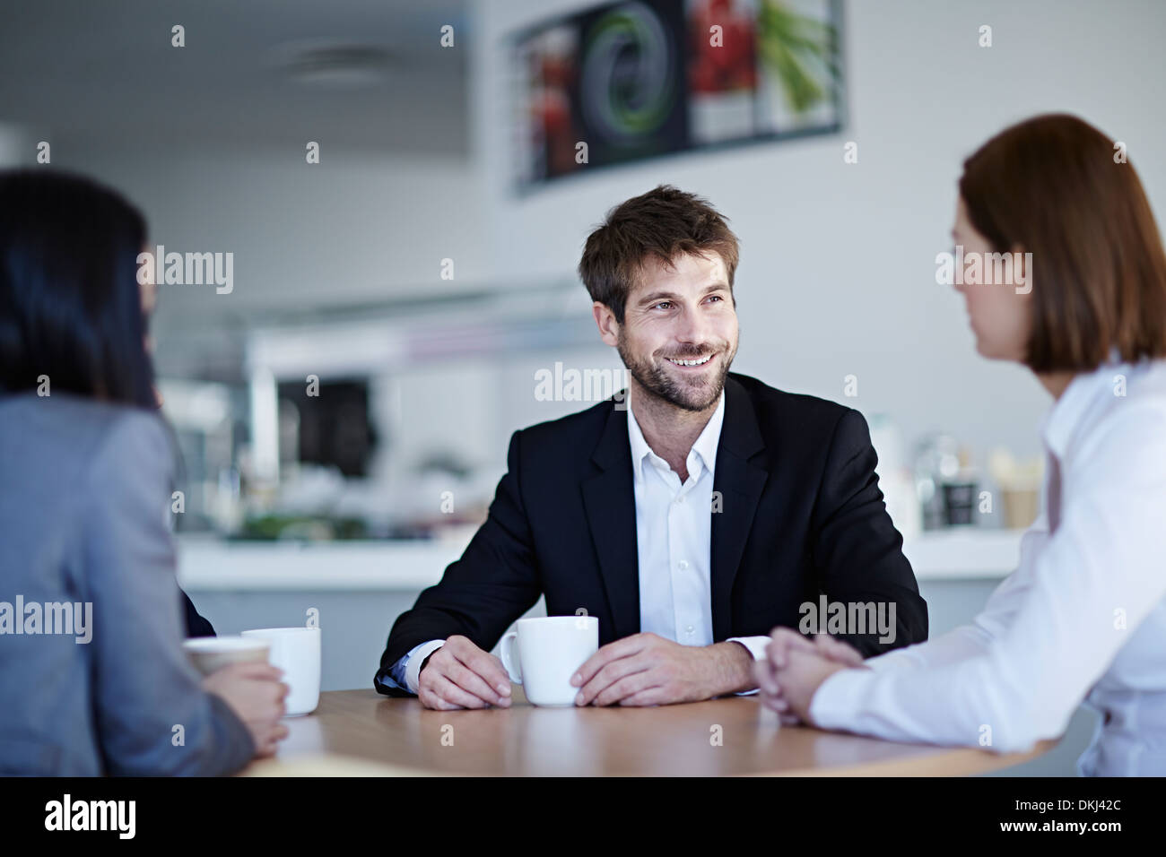 Business people talking in cafe Stock Photo
