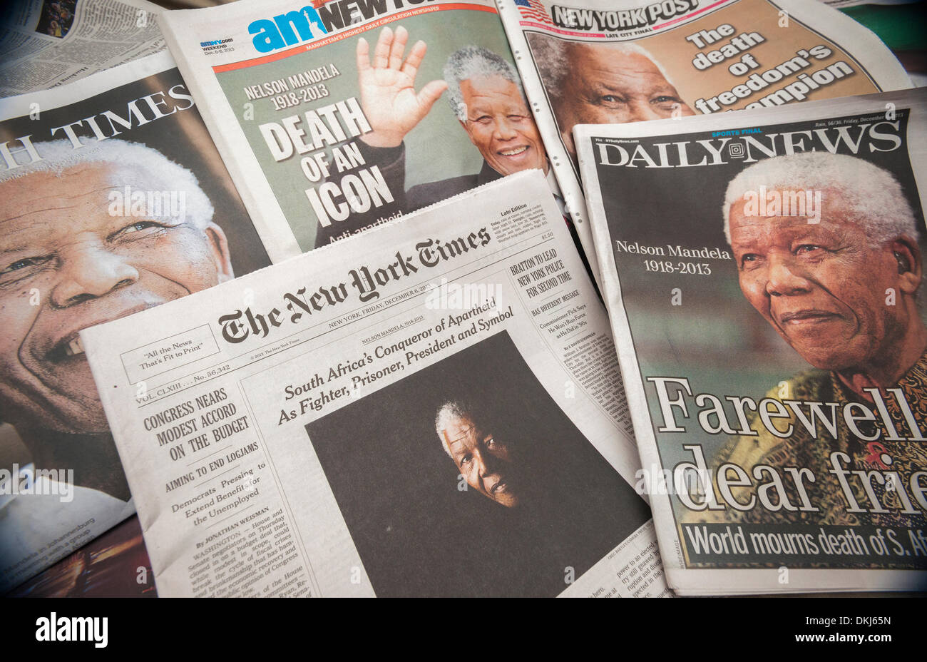 NY, NY, USA. 6th Dec, 2013. New York newspaper covers on Friday, December 6, 2013 report on the death of South African civil rights activist Nelson Mandela at the age of 95. Credit:  Richard Levine/Alamy Live News Stock Photo