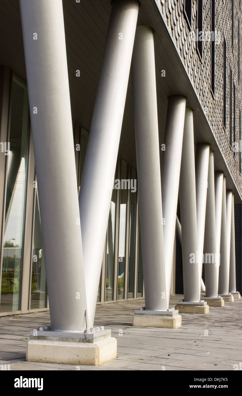 Metal pillars as foundation of a building Stock Photo