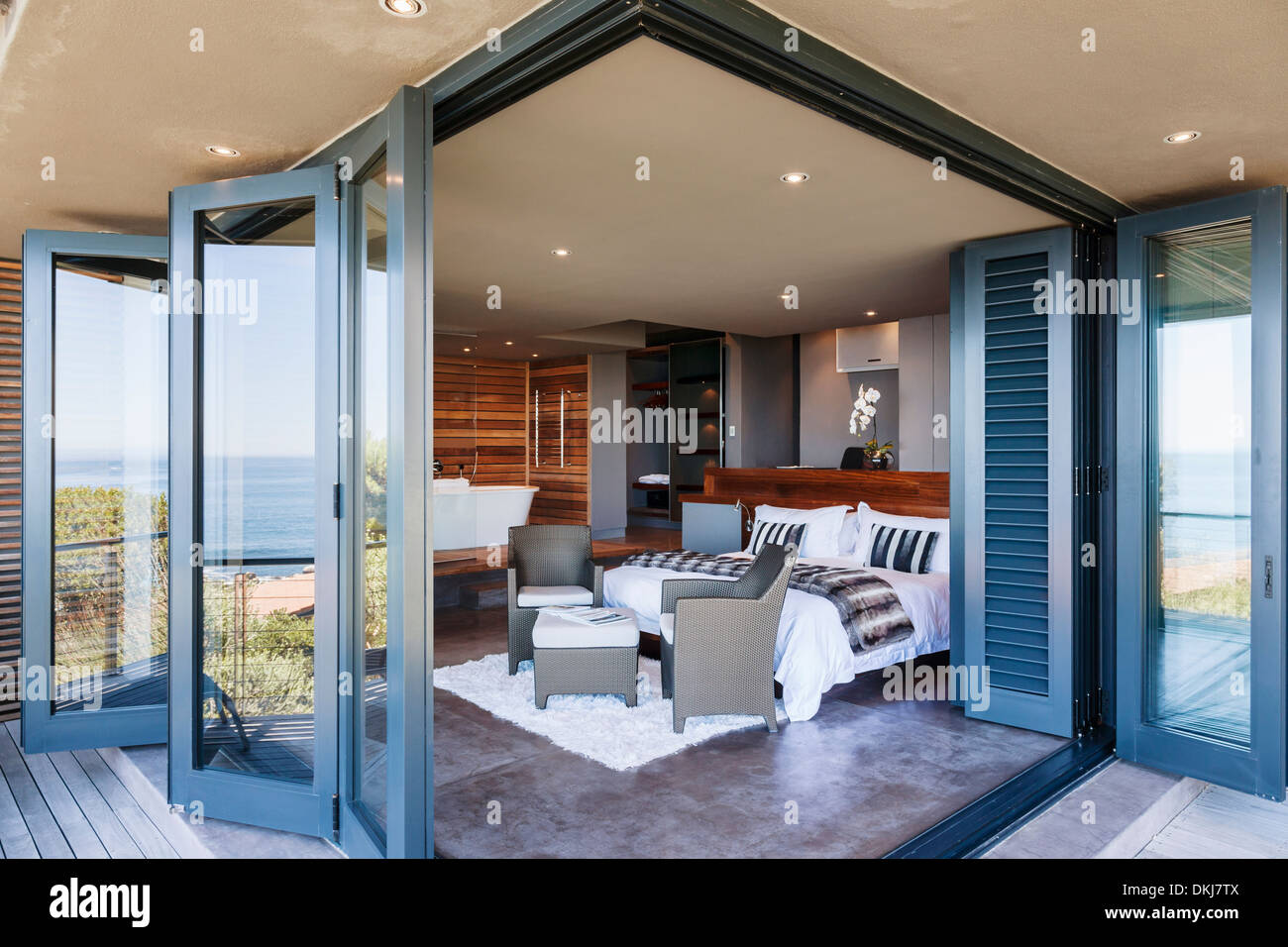 Bed with opening door to outside hires stock photography and images