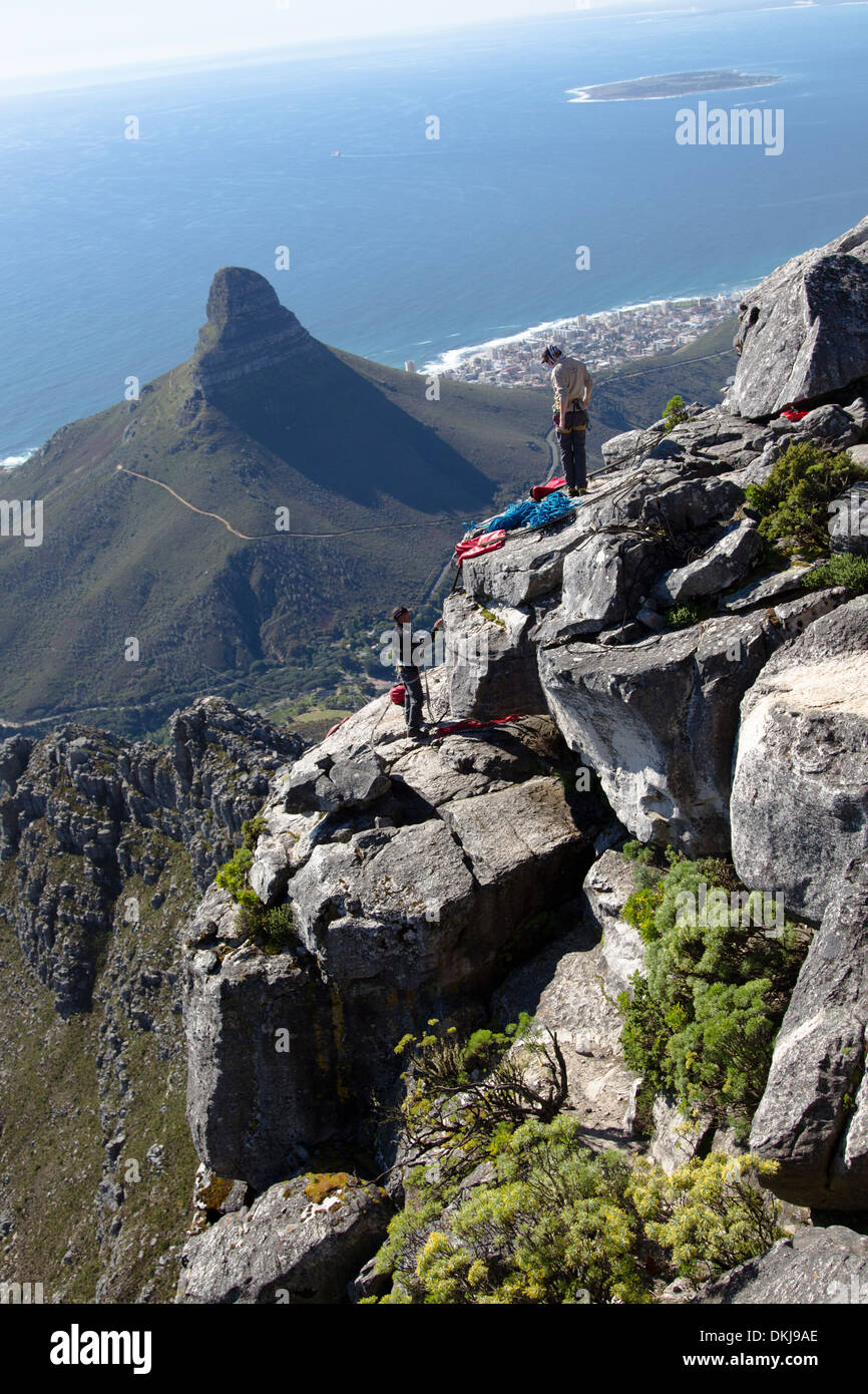 Two climbers abseiling on Table Mountain, Cape Town. Stock Photo
