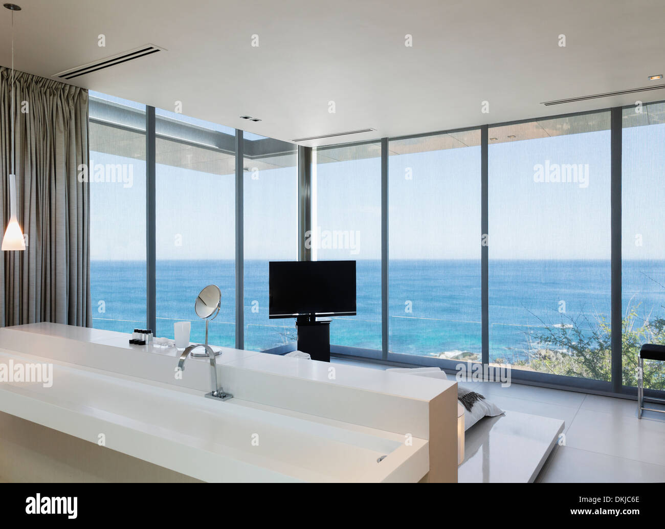 Modern bedroom with ocean view Stock Photo