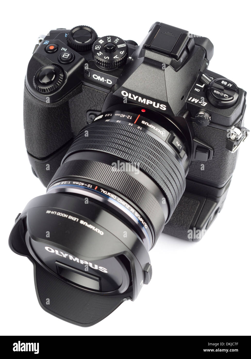 Olympus OM-D E-M1 digital mirrorless camera with HLD-7 vertical grip and 12-40mm f/2.8 pro zoom lens Stock Photo