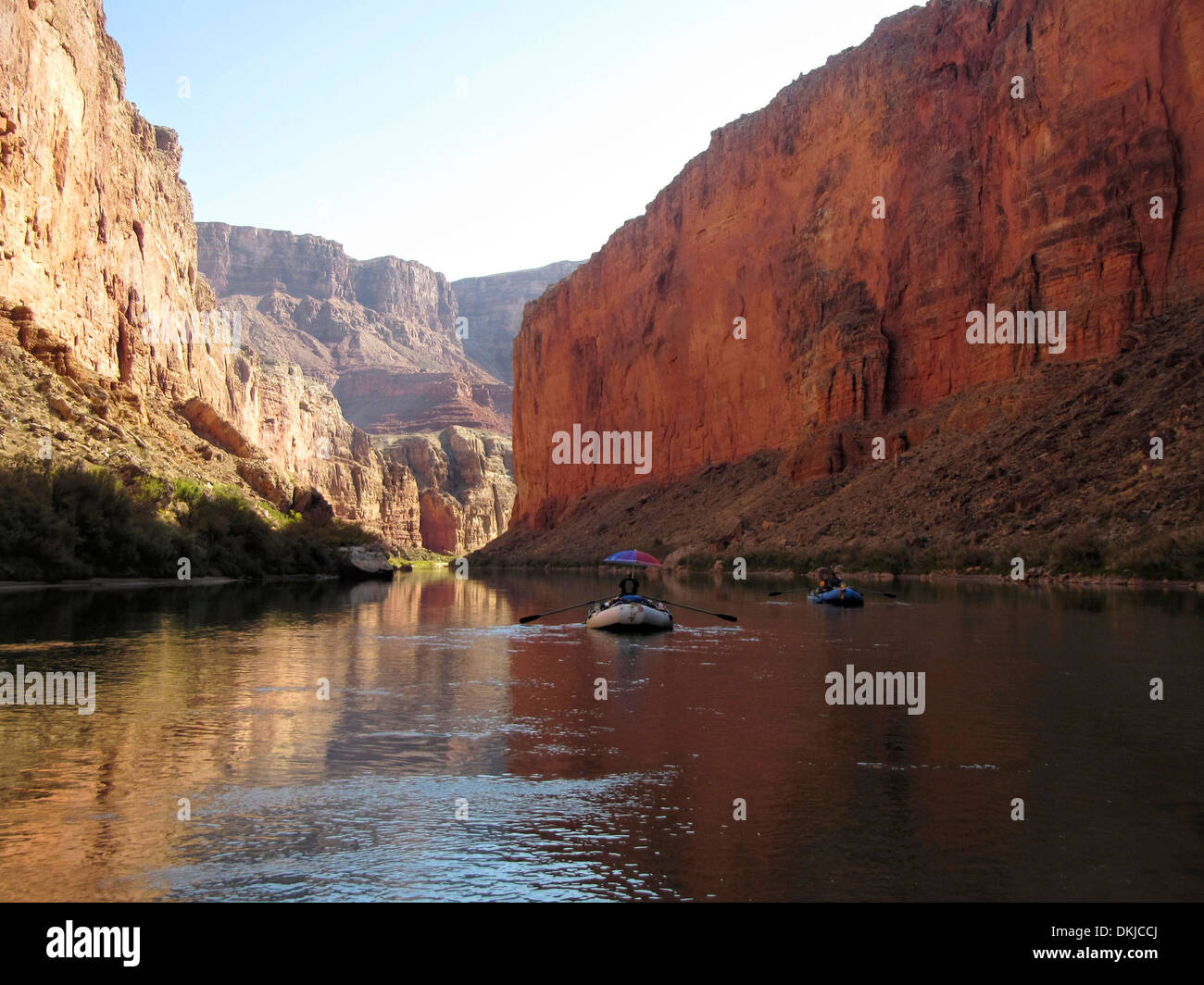 Two rafts in a calm stretch of the Redwall section of the Grand Canyon. Stock Photo