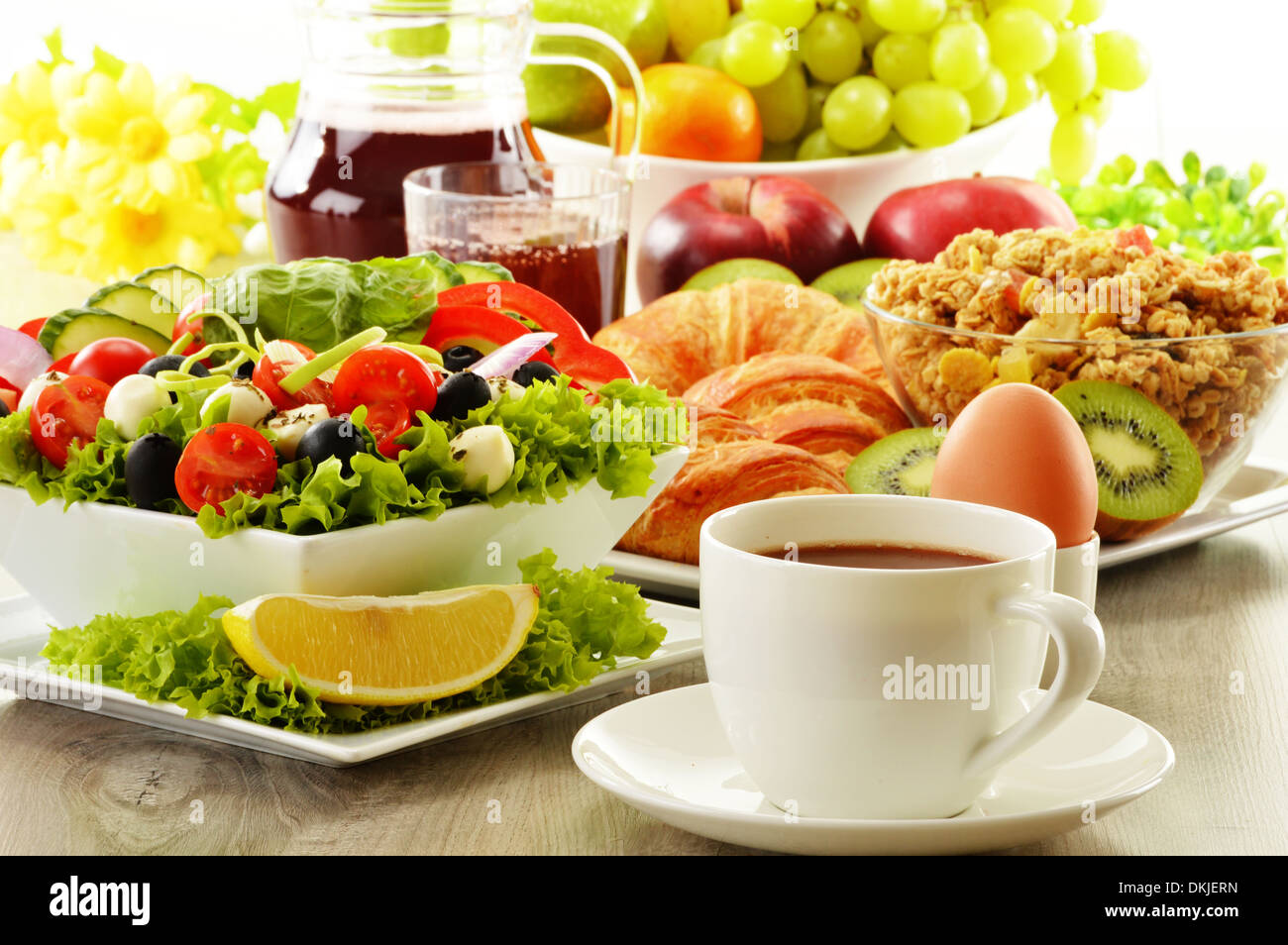 Breakfast with coffee, juice, croissant, salad, muesli and egg. Swedish buffet Stock Photo