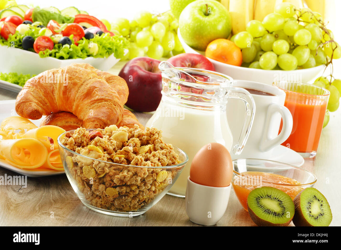 Breakfast with coffee, juice, croissant, salad, muesli and egg. Swedish buffet Stock Photo