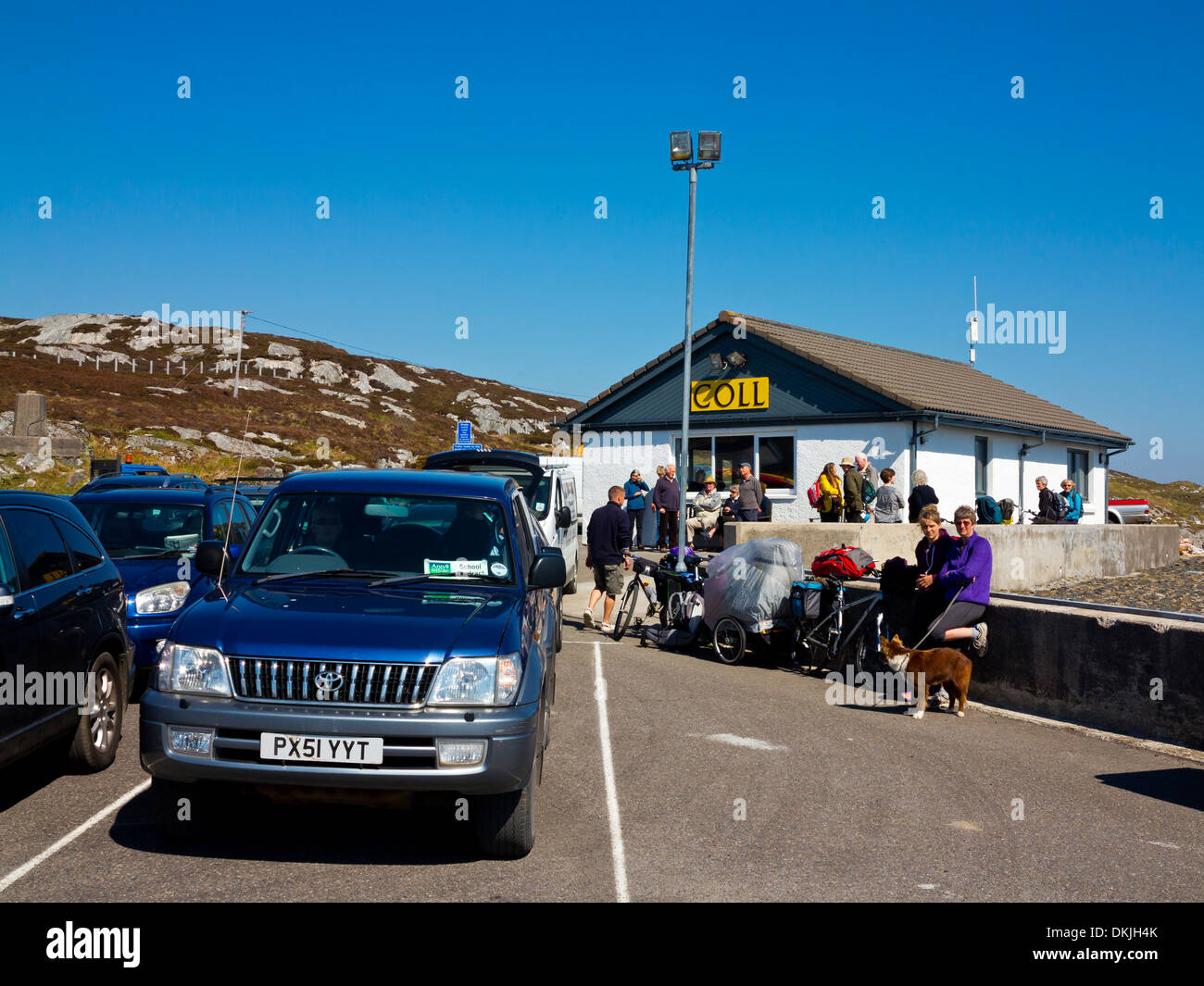 Passengers waiting to board Caledonian MacBrayne car ferry at Arinagour Isle of Coll Inner Hebrides Argyll and Bute Scotland UK Stock Photo