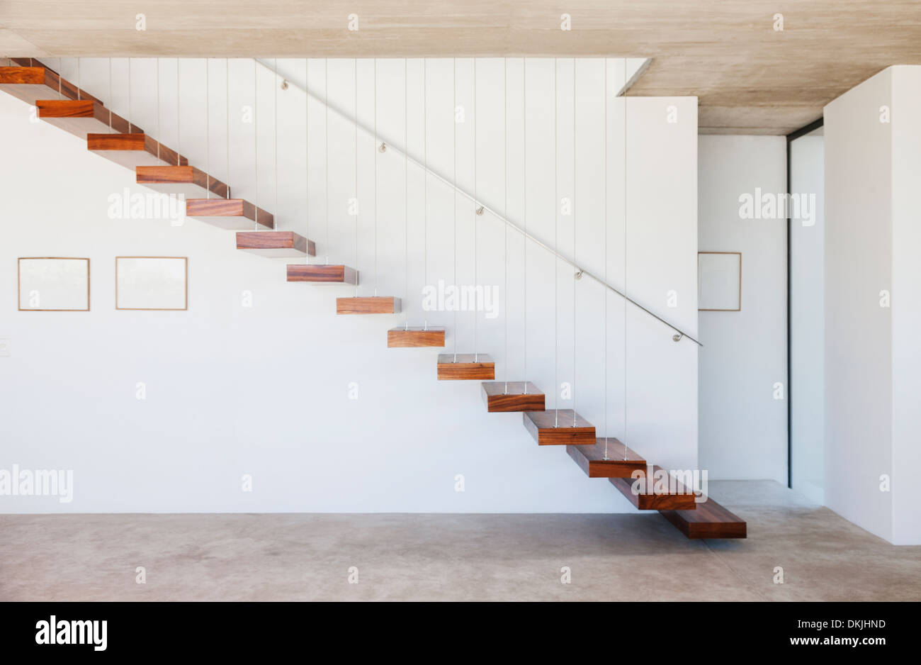 Floating staircase in modern house Stock Photo - Alamy