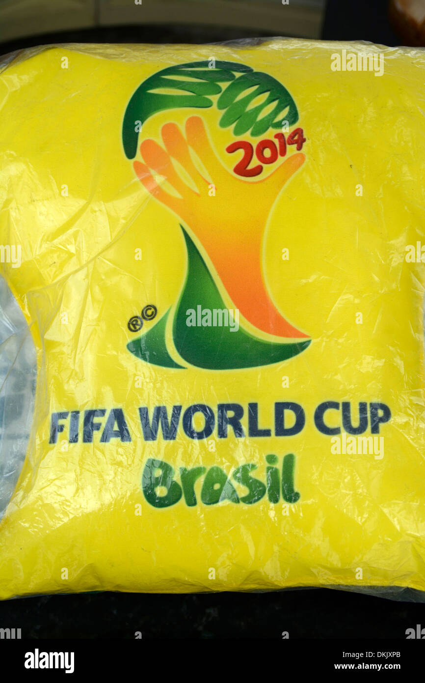 A seat cushion bearing official Brazil World Cup 2014 markings on sale in Rio de Janeiro, Brazil Stock Photo