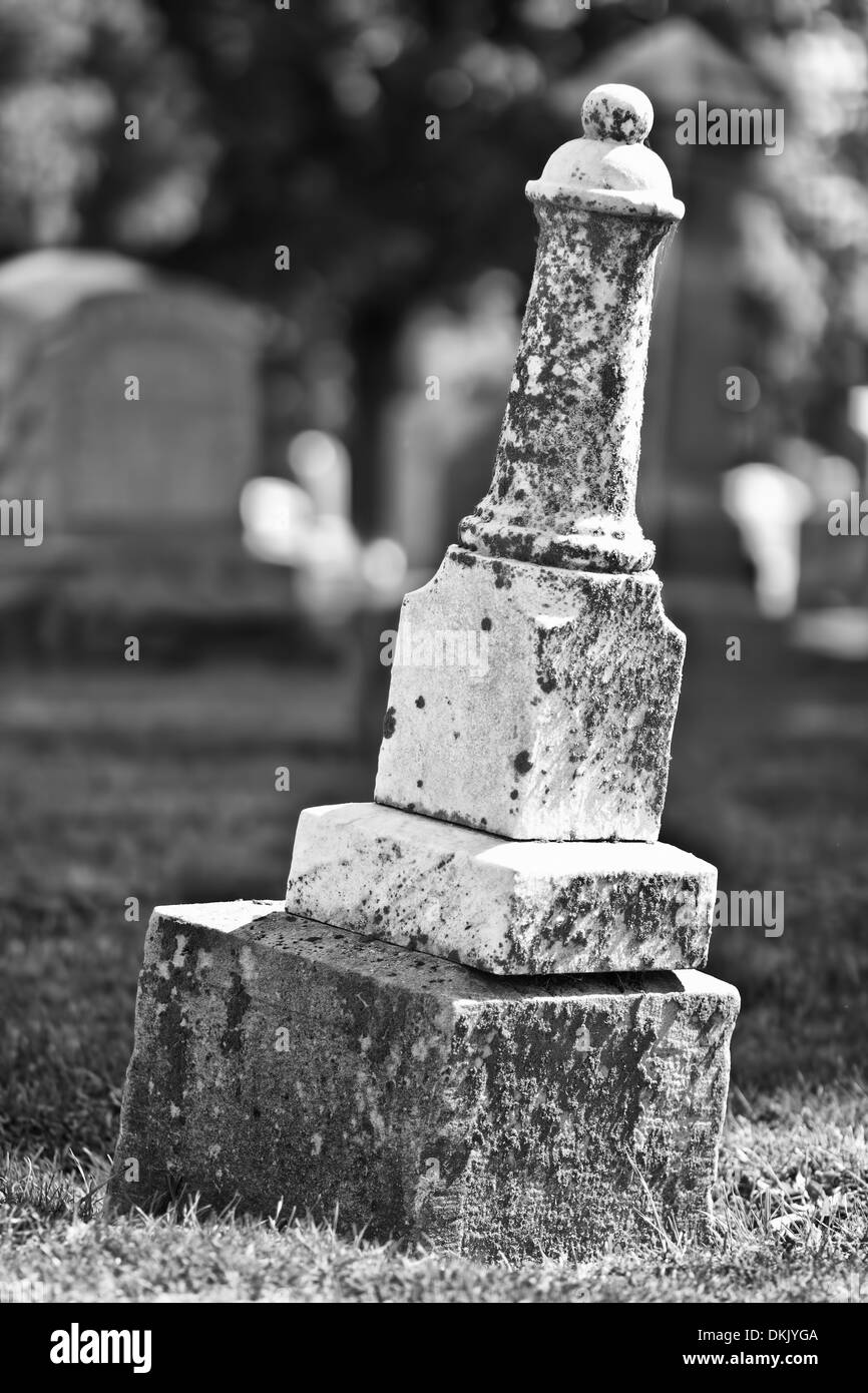 Leaning Headstone Black and White of a Leaning Headstone Stock Photo