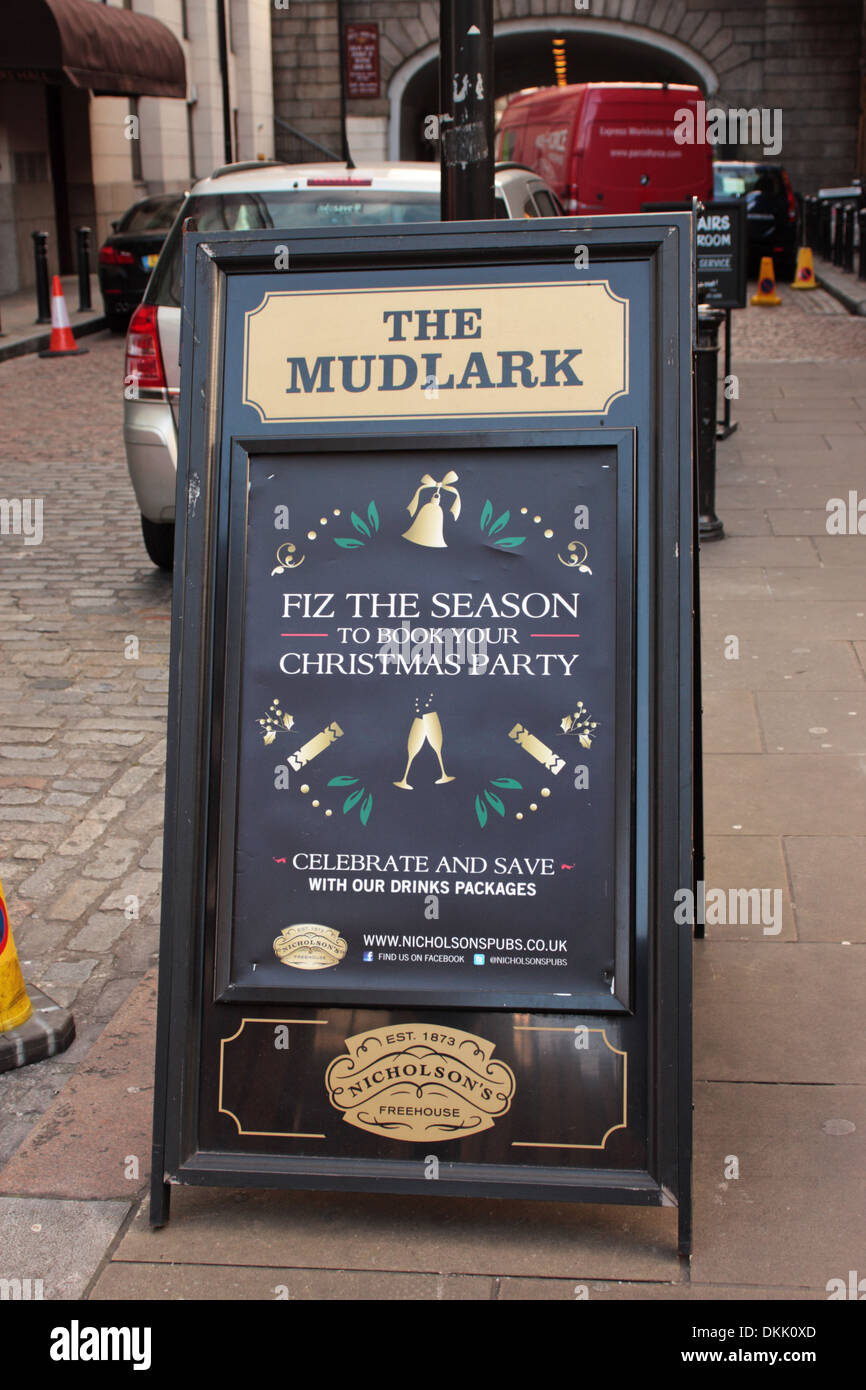 A board advertising the Mudlark Pub Southwark London for Christmas parties Stock Photo