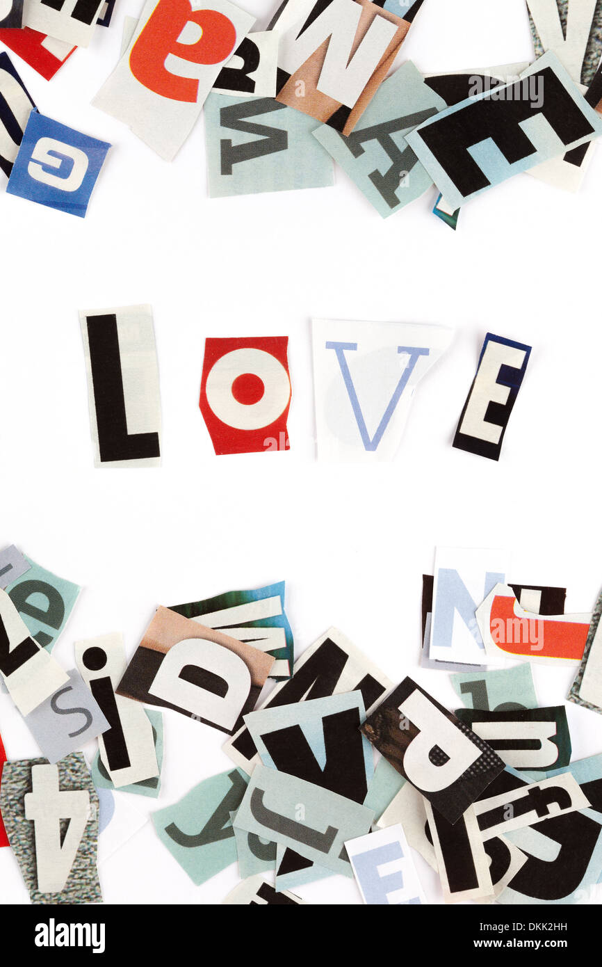 Love inscription made with cut out letters Stock Photo