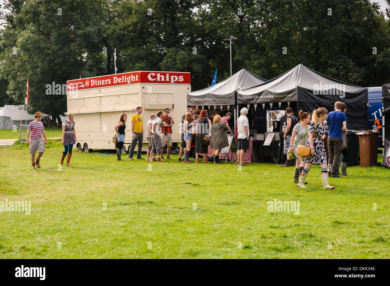 Queuing for breakfast and coffee in a field at a British music festival. Stock Photo