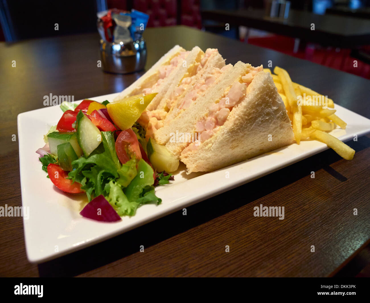 Prawn sandwich on white bread with salad and chips Stock Photo Alamy
