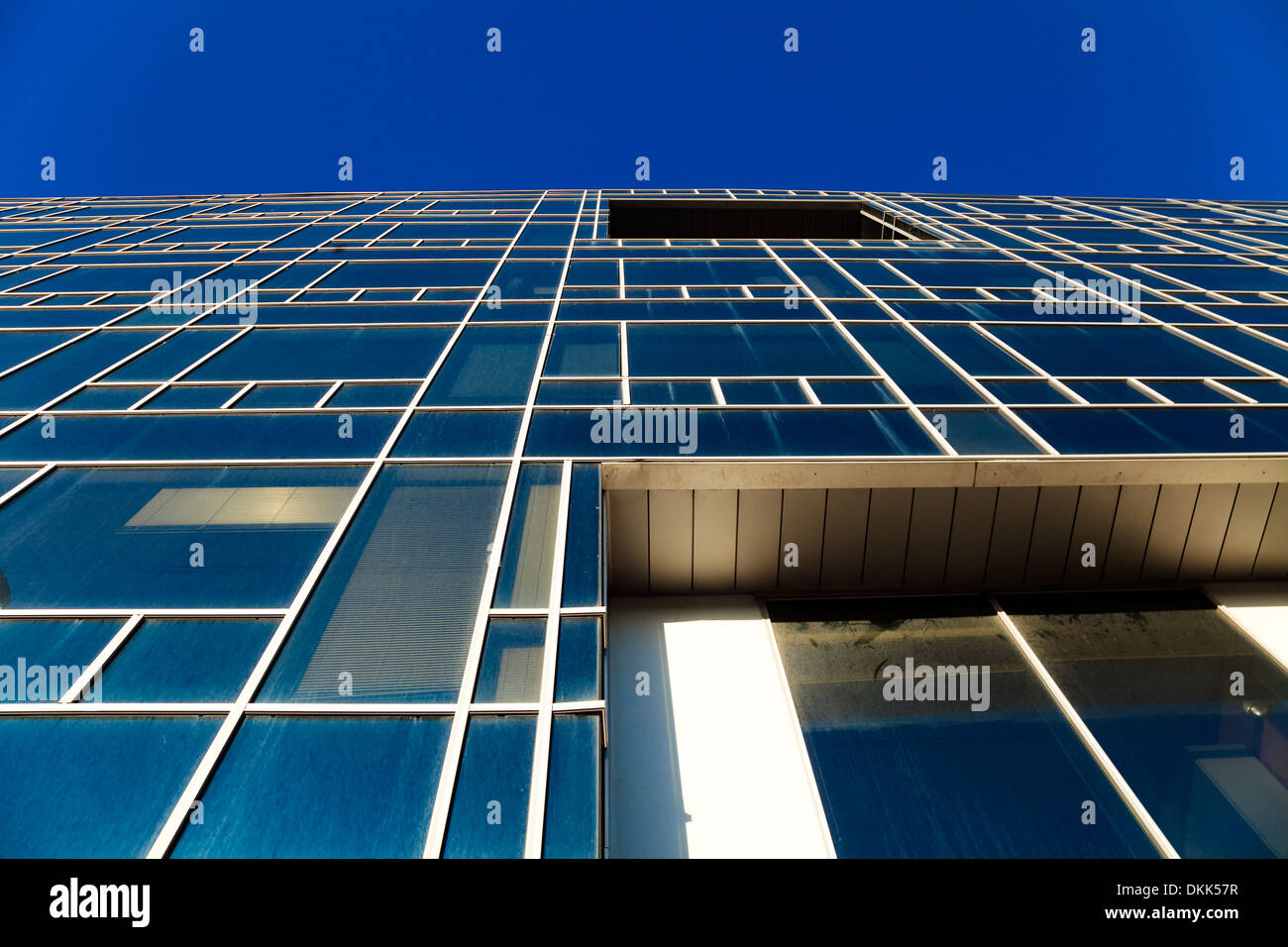 Office building on the basis of large windows and of modern style Stock Photo Alamy