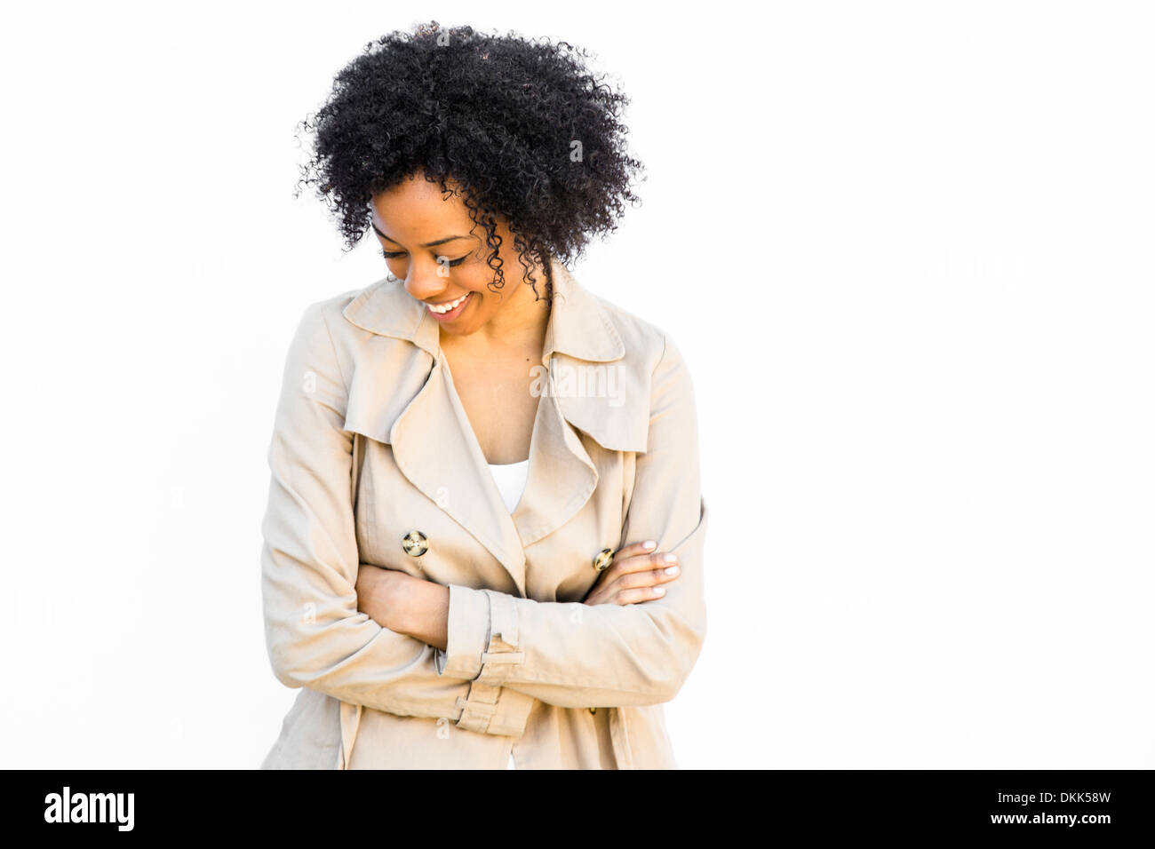 African American woman smiling and looking down Stock Photo