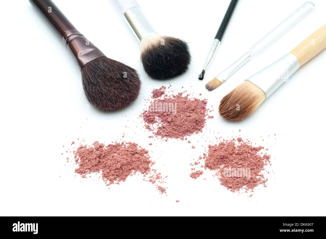 Makeup brushes and powder isolated on white Stock Photo