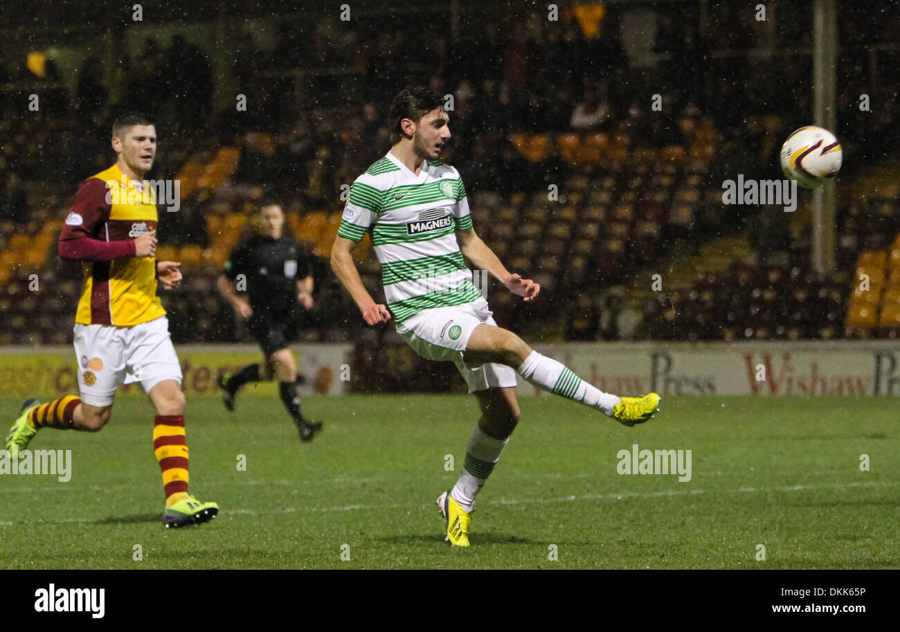 Motherwell, Scotland. 06th Dec, 2013. Bahrudin Atajic lobs the ball into the net during the Scottish Premier League game between Motherwell and Celtic from Fir Park. Credit:  Action Plus Sports/Alamy Live News Stock Photo
