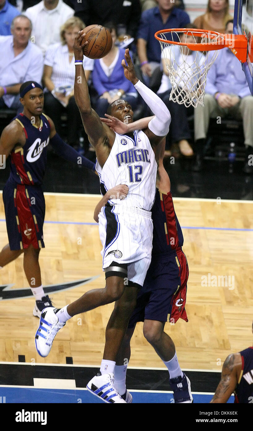 May 26, 2009 - Orlando, Florida, U.S. - Orlando Magic center DWIGHT HOWARD is hacked by ANDERSON VAREJAO during their game 4 Eastern Conference Finals game against the Cleveland Cavaliers at the Amway Arena. (Credit Image: © Jacob Langston/Orlando Sentinel/ZUMAPRESS.com) Stock Photo