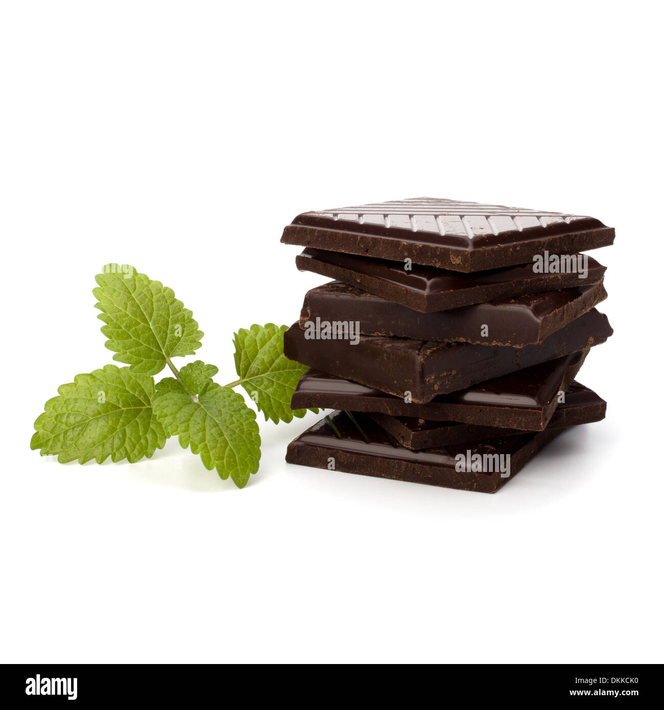 Chocolate bars stack and mint leaf isolated on white background Stock Photo