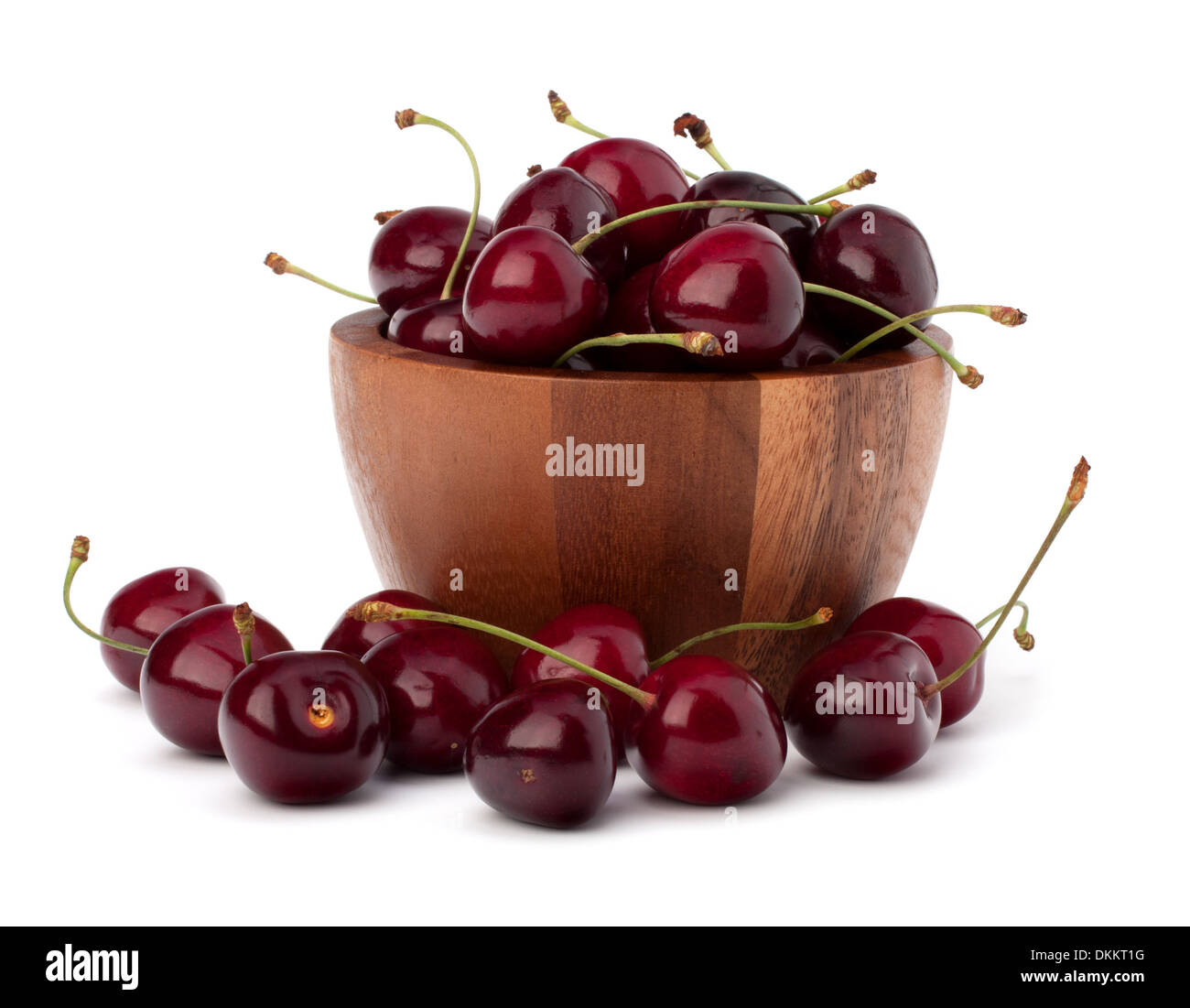 Cherry in wooden bowl isolated on white background Stock Photo - Alamy