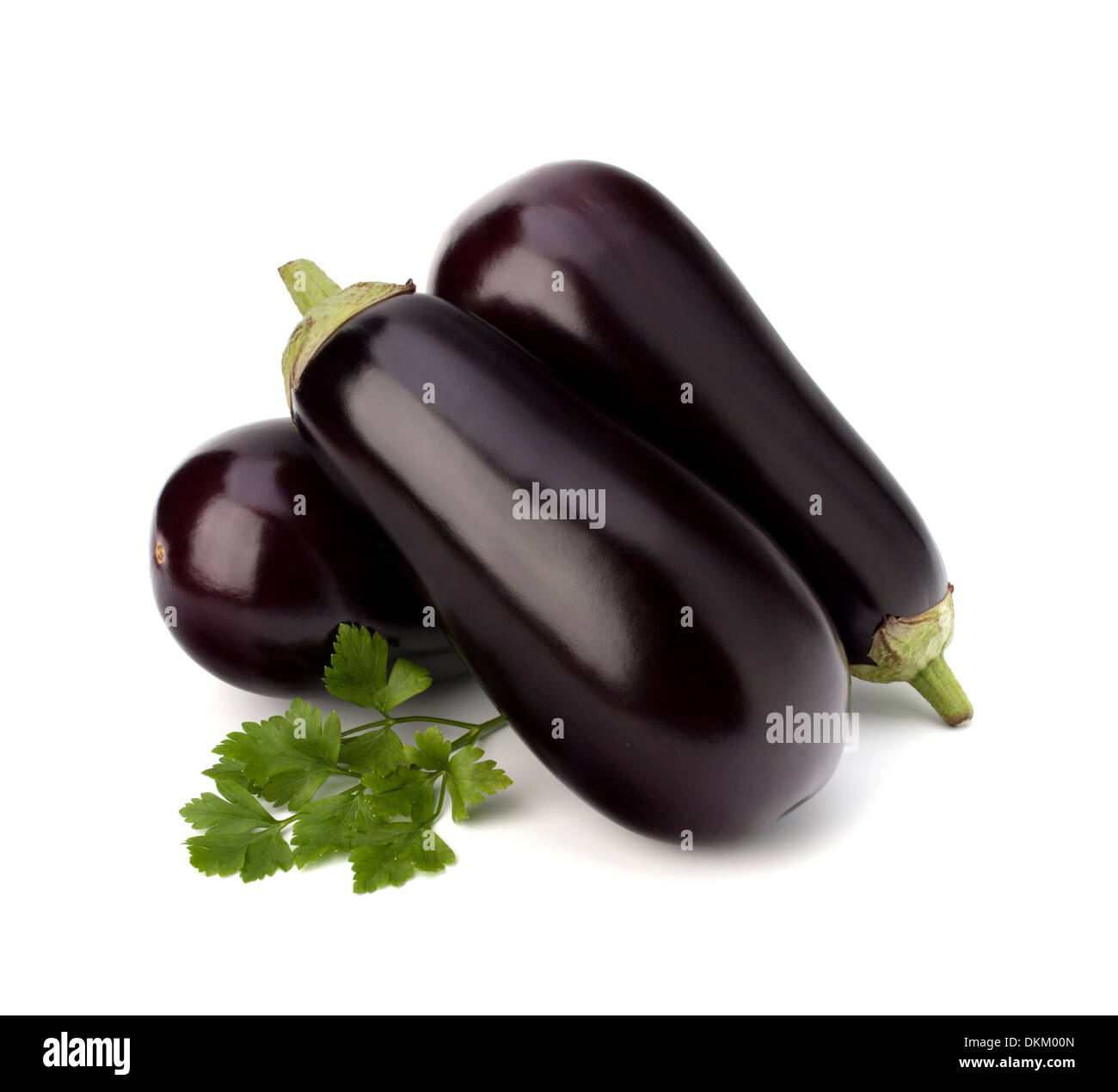 eggplant or aubergine and parsley leaf on white background Stock Photo
