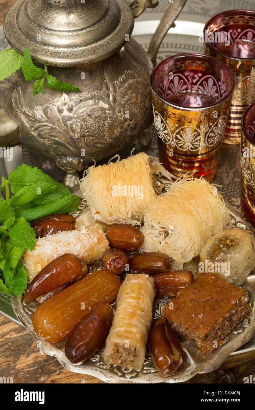 Traditional dates and cookies on a Moroccan tea tray Stock Photo
