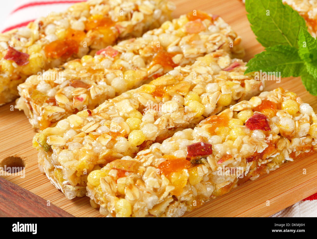 Cereal bars with pieces of dried apricot and apple Stock Photo